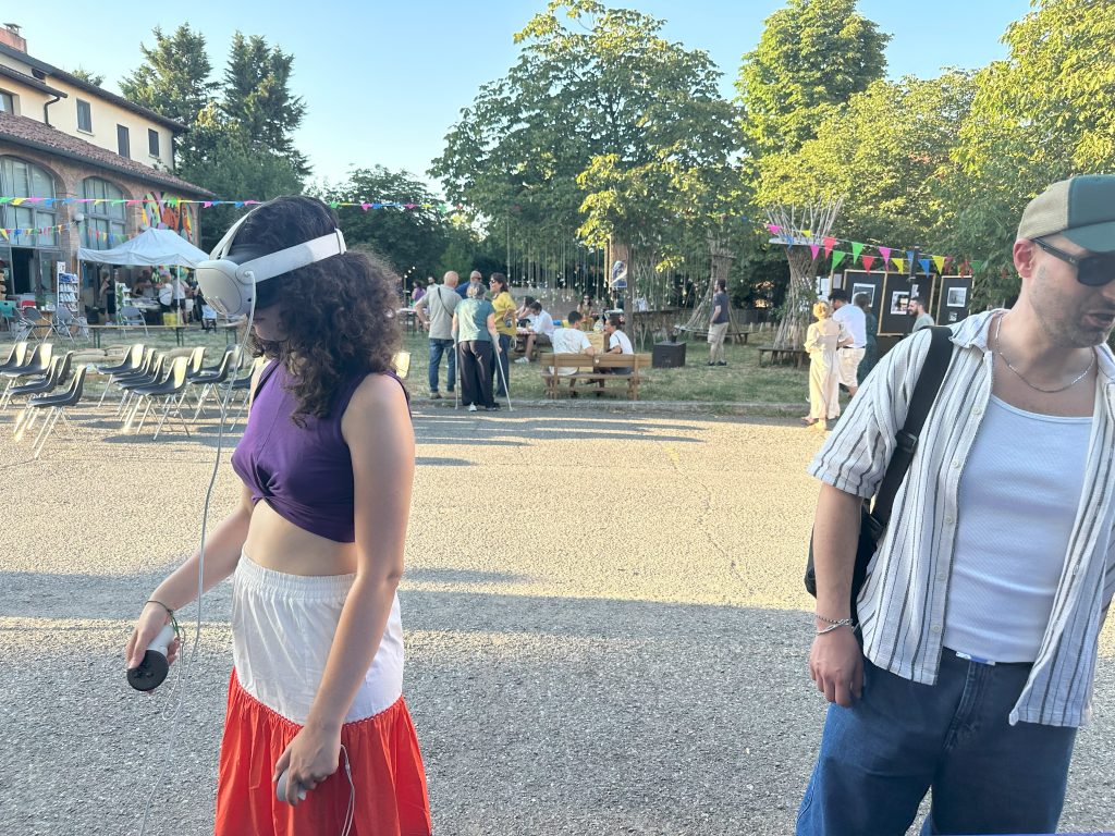 Benny wearing the Meta Quest 3 in front of a crowd